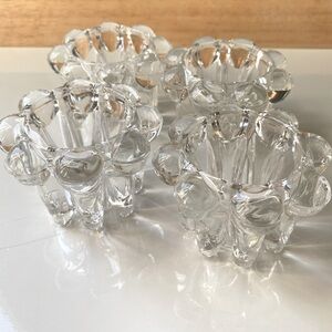 4 Crystal clear Candle Holders.